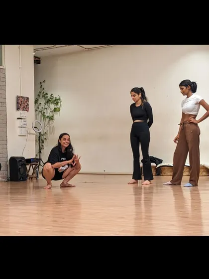 Our instructor breaks down a movement for a small group of beginners, ensuring everyone understands the technique and feels supported.