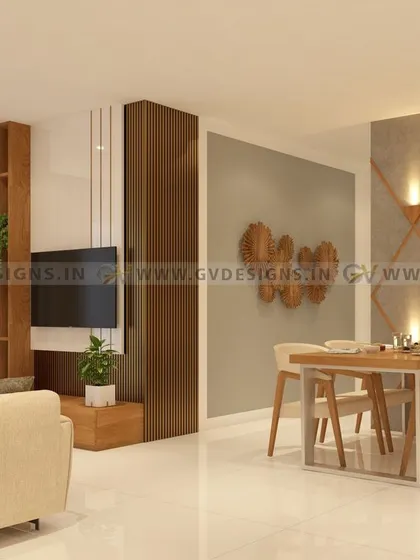 This open-plan living and dining area is defined by its clean lines and thoughtful details. We designed a custom TV unit with rafter wood accents and created a distinct dining zone with a feature wall and unique sconce lighting.