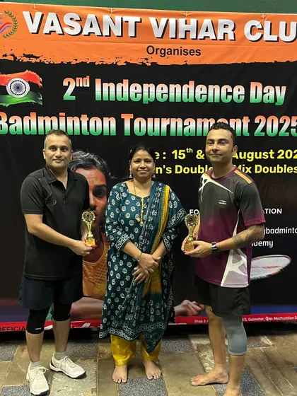 Participants all smiles as they receive their trophies at the Independence Day tournament.