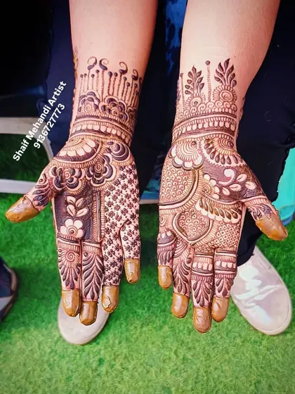A watermarked photo of a dense, traditional palm design.