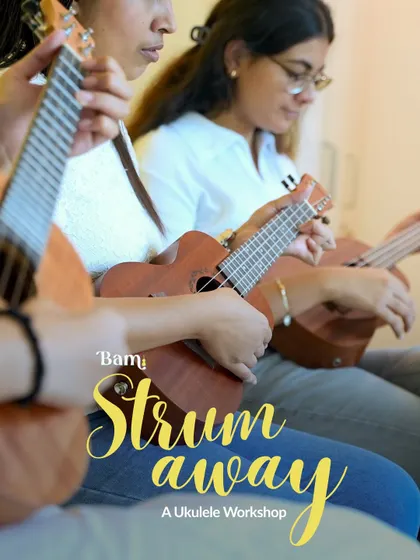 Ready to "Strum Away"? This is the poster for our beginner's ukulele workshop. As you can see from the focused students, it's a hands-on session where you will learn to play both an English song and a Hindi favorite in just 1.5 hours.