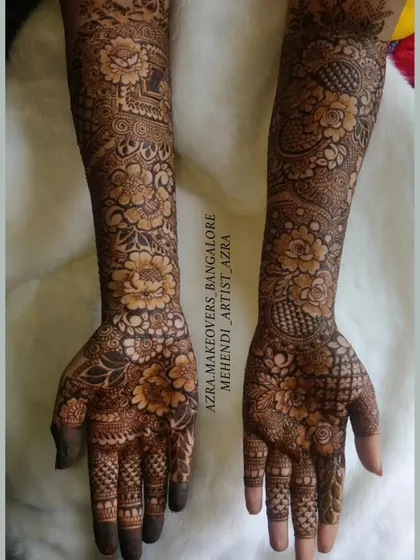 A beautiful full-arm floral mehendi design, perfect for a bride or for a special occasion.