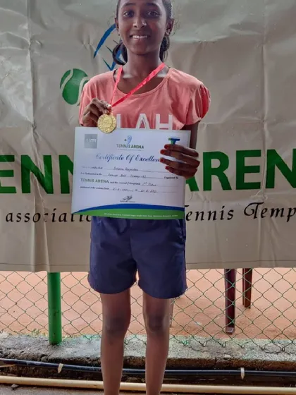 Another champion in the making. We are so proud to see our players compete and succeed, like this winner from our recent kids' tennis event.