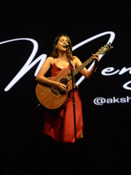 On stage, opening for Anuv Jain. My name in lights behind me, a guitar in my hand. This is what I've worked for.
