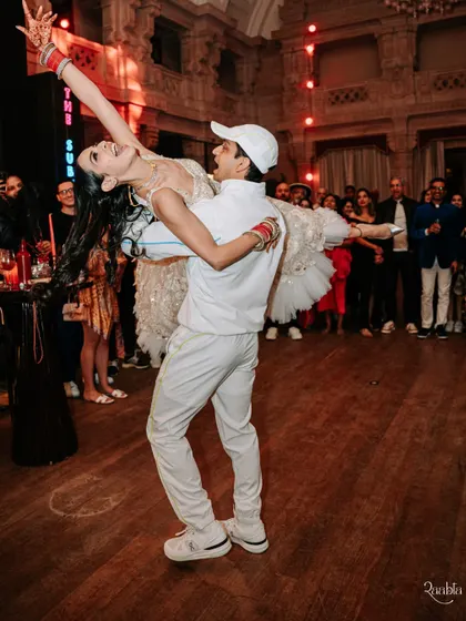 The after-party dip! A high-energy moment from the dance floor at Amala and Aditya's sporty vs. stylish celebration inside the palace.