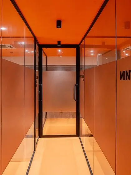 The 'Mint Treasury Room' corridor in a commercial space I consulted for. The design uses specific colors and directional flow to enhance the financial energy of the office.