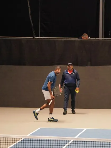 Working on my return of serve, a critical part of the doubles game.