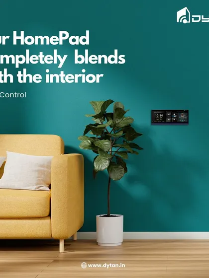 Technology and style unite with the HomePad. It is designed to blend with any interior, from modern to classic, as seen here against a bold, dark teal wall.