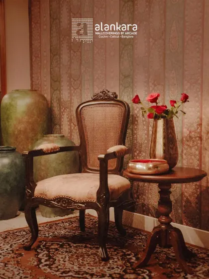 The Murano Kursi, an antique-style chair I crafted, inspired by tradition but designed for today. It features ornate carvings, a cane back, and plush seating.