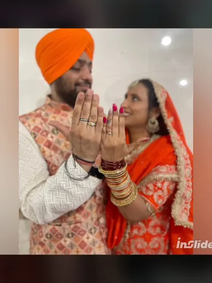Showing off their engagement rings! A close-up of the bride's happy face, with her glowing makeup and traditional attire.