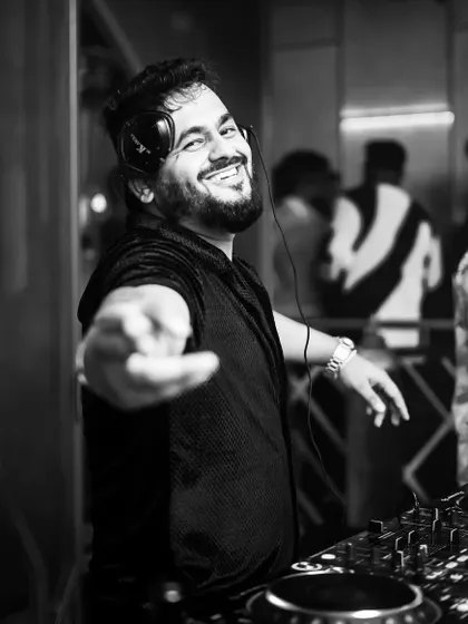 Eyes on the crowd, beats in the blood. This black and white portrait captures the intense connection I feel with my audience.