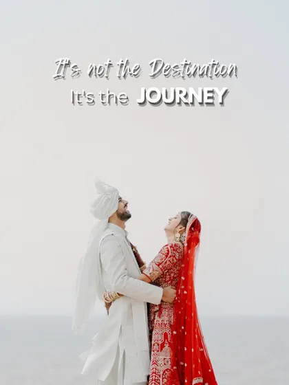 "It's not the Destination, It's the JOURNEY." A powerful shot of the couple looking up towards the sky, symbolizing the start of their new journey together.