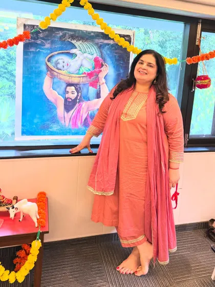 Easy, breezy, and festive. A client celebrating Janamashtmi in a custom pink cotton satin kurta set, beautifully detailed with traditional gota work.