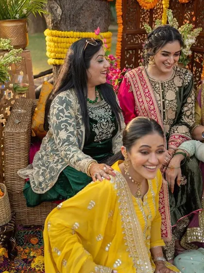 A beautiful candid moment between the bride and her bridesmaids.