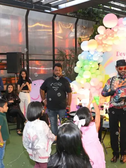 A bubble show in action at a Peppa Pig themed party. This form of entertainment is perfect for both indoor and outdoor events and always draws an engaged and happy crowd.