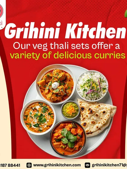 Our veg thali sets offer a variety of delicious curries. Here you can see different paneer preparations and dal, served with rice and naan.