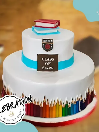 A special cake for the bright minds at Presidium School Noida. This two-tier design celebrates the Class of 24-25 with edible books and a colorful pencil border, a perfect graduation cake.
