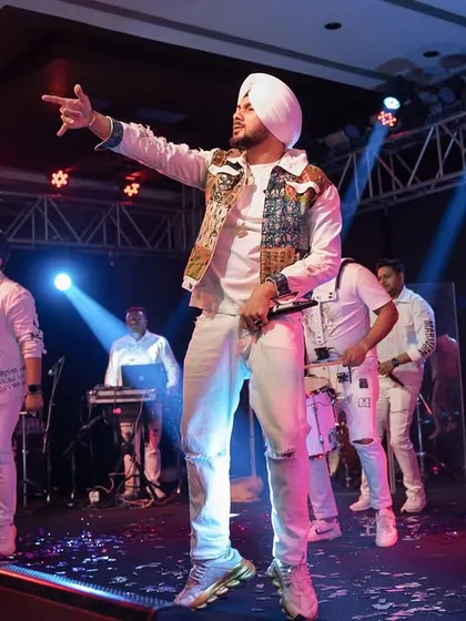 A high-energy performance on the Sangeet stage. We capture not just the couple, but the entire vibe of the party, including the live entertainment.