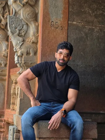 Taking a moment at a temple. My journeys are often about exploring the rich culture of our land.