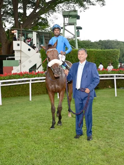 Golden Thunder, winner of The Bangalore St. Leger (GR III), is pictured with jockey S. Antony Raj and the owner.