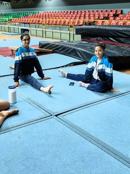 More moments of triumph from various competitions, showcasing our gymnasts with their medals, trophies, and proud coaches.