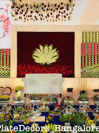 A large-scale platter arrangement in a function hall. I can set up the entire gift table to match the event's decor, as seen with this blue and gold themed display.