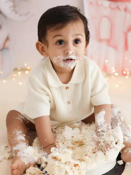 Pure, unfiltered joy. A first birthday cake smash is a celebration of a huge milestone, and I love capturing the messy, wonderful chaos of it all. This image is the essence of that fun, a memory of sweet treats and even sweeter giggles.