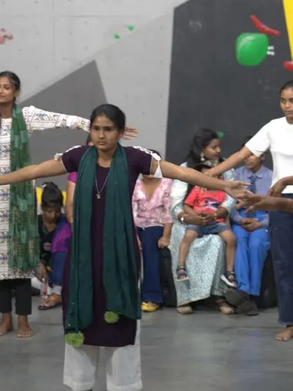 It wasn't just about climbing. The kids also shared their own talents with us, performing a dance for the group. This moment captures the wonderful cultural exchange and shared joy of the day.