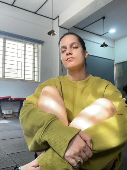 A quiet moment on a rest day during my period. It's crucial to give your body the break it asks for. Whether you prefer light stretches or complete rest, honoring your body's needs is a key part of a sustainable fitness lifestyle.
