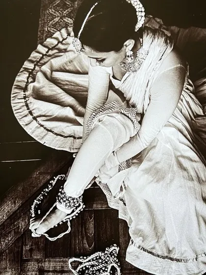 A detail shot from the courtesan-inspired photoshoot, focusing on the ghungroos (ankle bells).