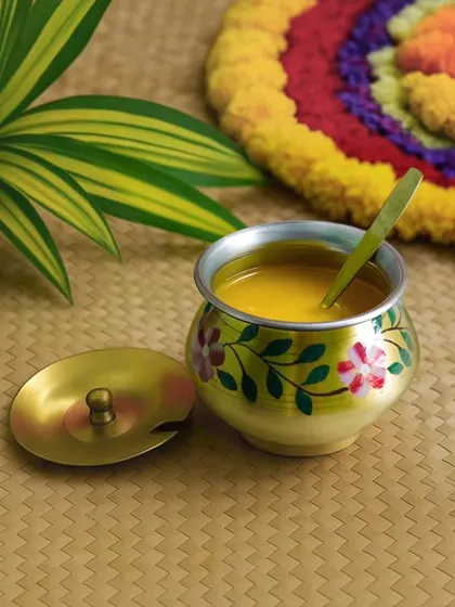 This hand-painted ghee pot is a beautiful example of redesigned traditional accents. It is a sustainable and thoughtful gift that adds a festive touch to any home.