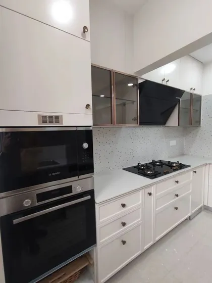 From render to reality. This is a completed PU finish modular kitchen in Bangalore, showing the clean lines, integrated appliances like the built-in oven, and smart storage solutions that I bring to my projects.