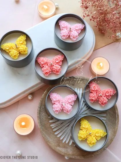 The pink and yellow 'Mariposa' butterfly candles look so cheerful and bright. They are perfect for spring and summer gifting.