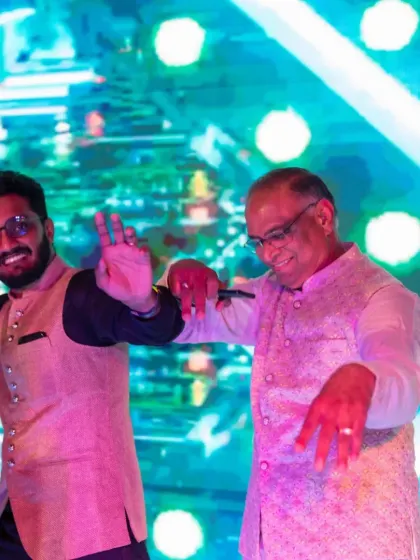 A fun moment between a father and son on the dance floor. I love creating choreography that allows for playful interactions between family members.