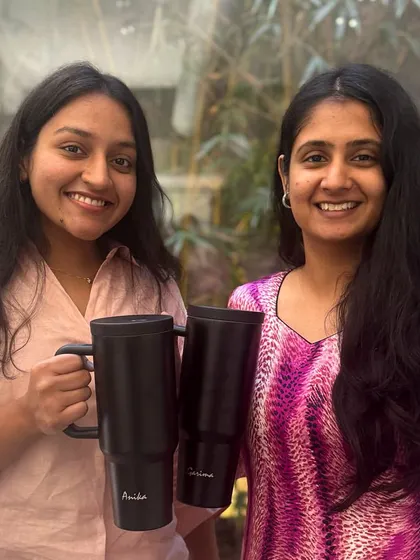 Two of our team members, showcasing the collaborative and positive spirit that defines our studio culture. We believe in building a team that is as strong as our designs.