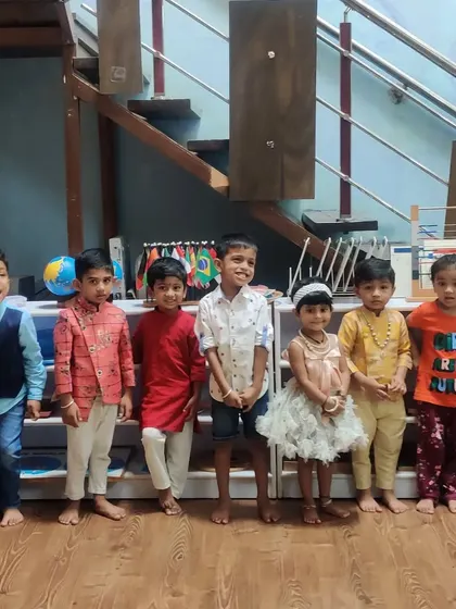 Our children dressed in their festive best for our Deepavali celebration. It's a joy to see them share their cultural traditions with their friends.