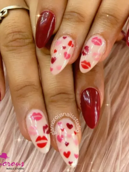 Sealed with a kiss. This romantic, Valentine's-themed set features a mix of deep red nails and accent nails covered in hand-painted hearts and lipstick kisses.