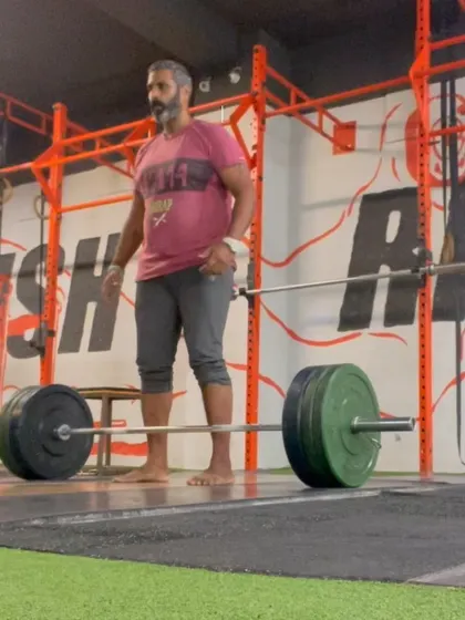 Here I am setting up for a deadlift. Proper technique is everything. I teach my athletes how to engage their lats, brace their core, and maintain a neutral spine to lift safely and build maximum strength.