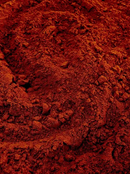 A close-up of our freshly ground Huli Pudi, or sambar powder. We make all our spice mixes in-house using family recipes, which is the secret to the distinct taste of our food.