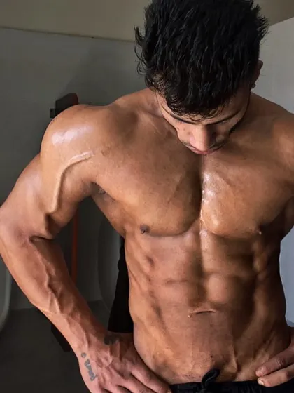 A front shot showing extreme vascularity and muscle separation. This is the "shredded" look we aim for at the peak of a contest prep.
