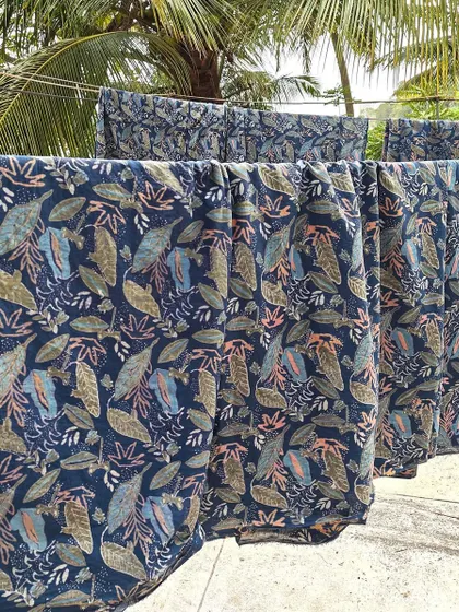 This intricate 7-part block print was created using a discharge printing technique with natural plant resins on organic cotton. The result is a beautiful, magical garden scene with a soft feel and vibrant detail.