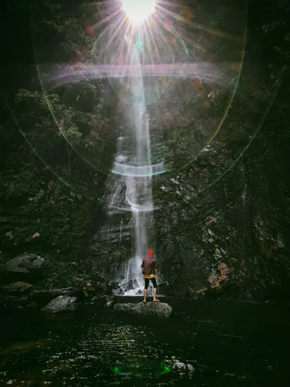 This magical shot of a waterfall, captured on an Oppo phone, uses a sun flare to create a dramatic, almost spiritual effect. It's an example of my ability to find and capture unique moments in nature.
