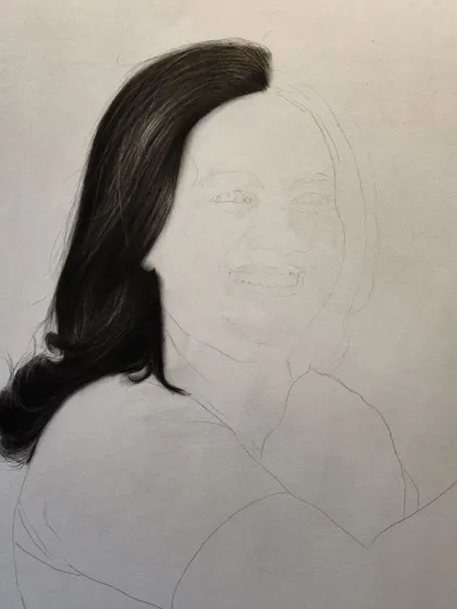 The very beginning of the portrait, focusing on the hair.