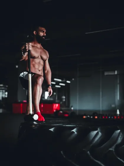 A duplicate image of a rest moment during a sledgehammer workout.