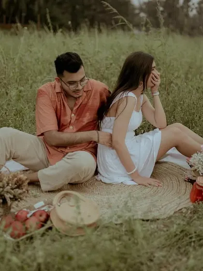 A candid moment of laughter during the picnic, showing the genuine fun they had.