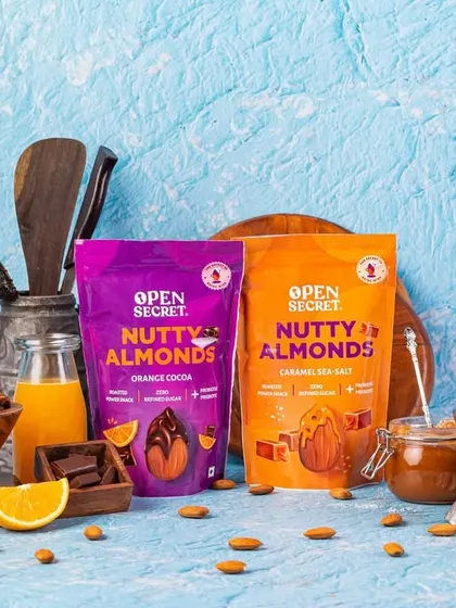 A beautifully styled group shot of Open Secret products. I use props and careful arrangement to create a story around the product, highlighting the key ingredients like orange and chocolate.