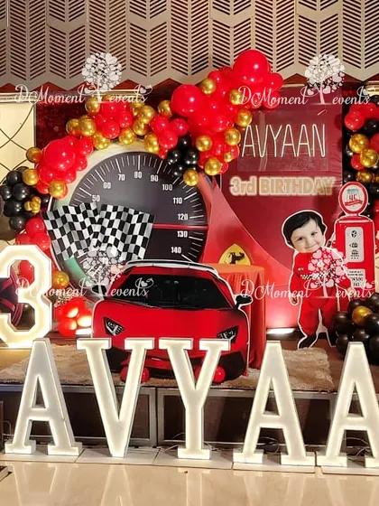 For little ones who love speed, this car-themed birthday stage is a guaranteed winner. Featuring a large sports car prop, a speedometer backdrop, and bold marquee letters, this setup brings high-octane excitement to a 3rd birthday celebration.