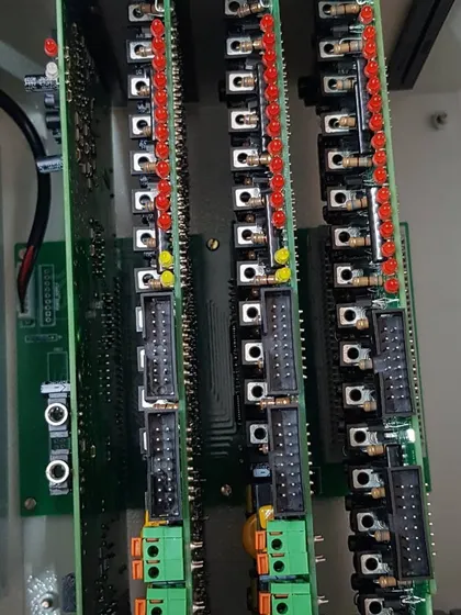 A close up of the connection terminals inside the intercom panel where each phone line is wired.