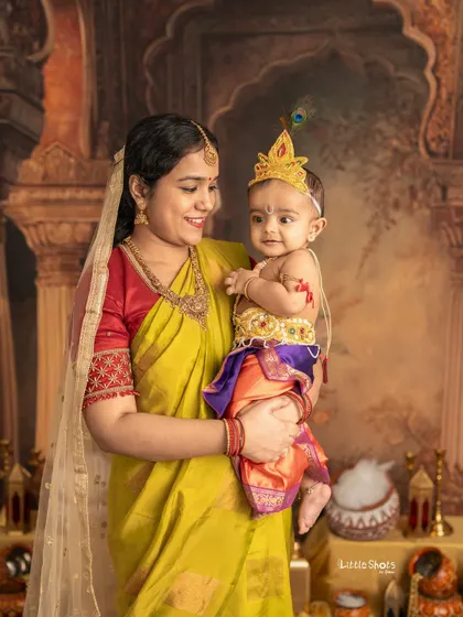 The loving gaze between a mother and her baby Krishna. These quiet, intimate moments are just as important to capture as the big smiles.