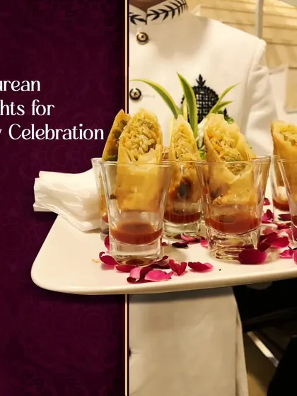 Epicurean delights for every celebration, like these crispy spring rolls served in shot glasses with dipping sauce. The presentation is both elegant and practical for a cocktail setting.